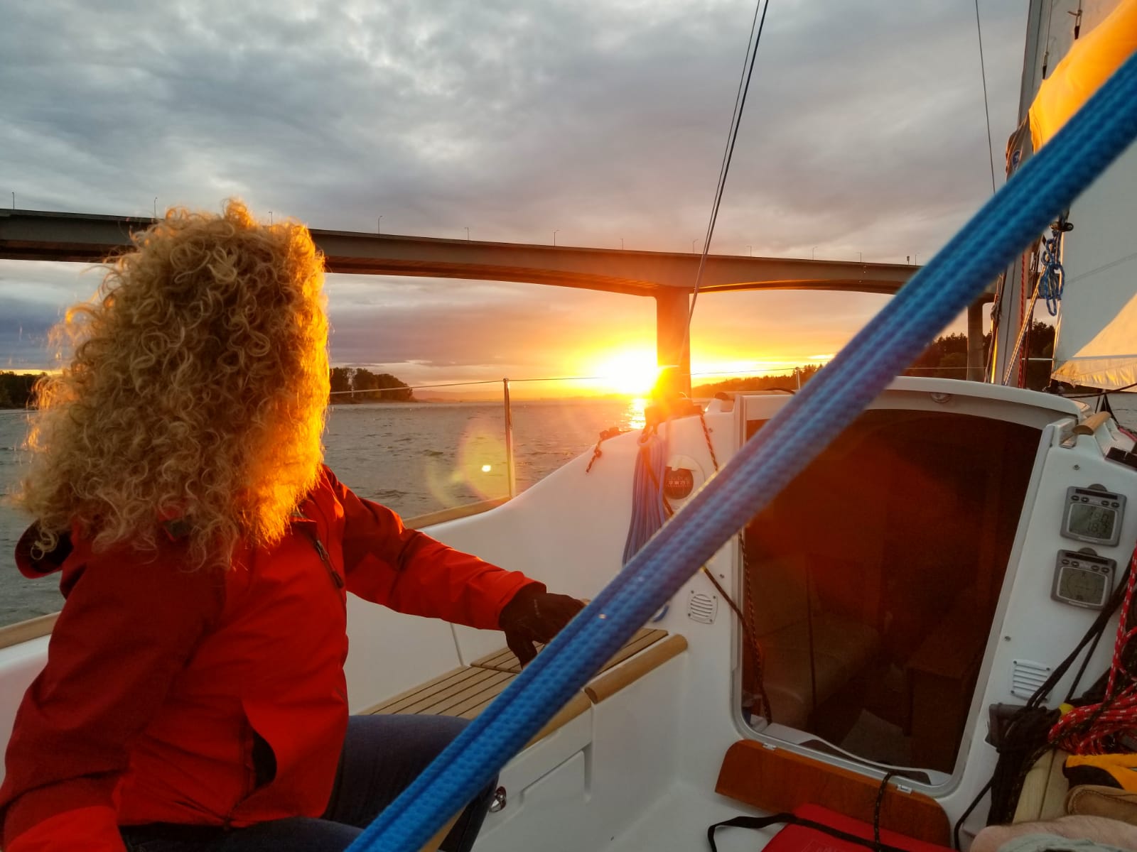 woman boating at sunrise